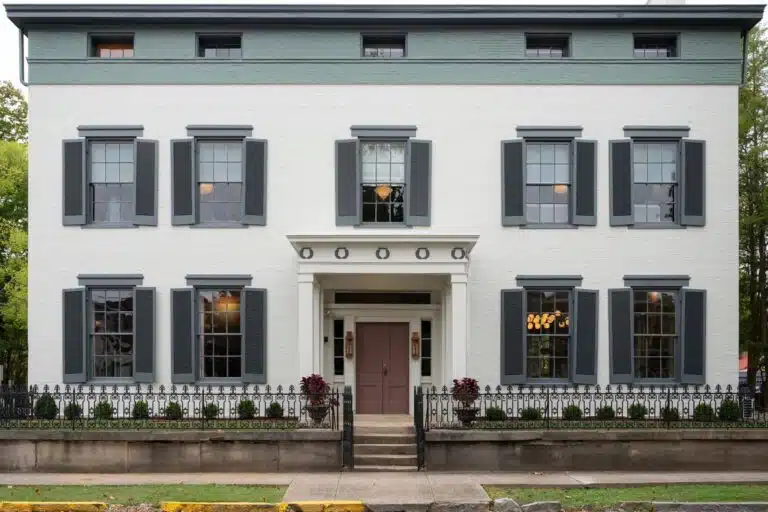 Exterior of The Ashbrook Hotel, a historic white, brick mansion in Frankfort, Kentucky. Once home of E.H. Taylor Jr., the "Father of the Modern Bourbon Industry"