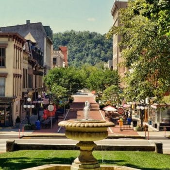 downtown Frankfort on a sunny summer day with the Old Capitol fountain in the foreground