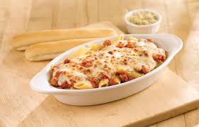 white dish of baked penne pasta