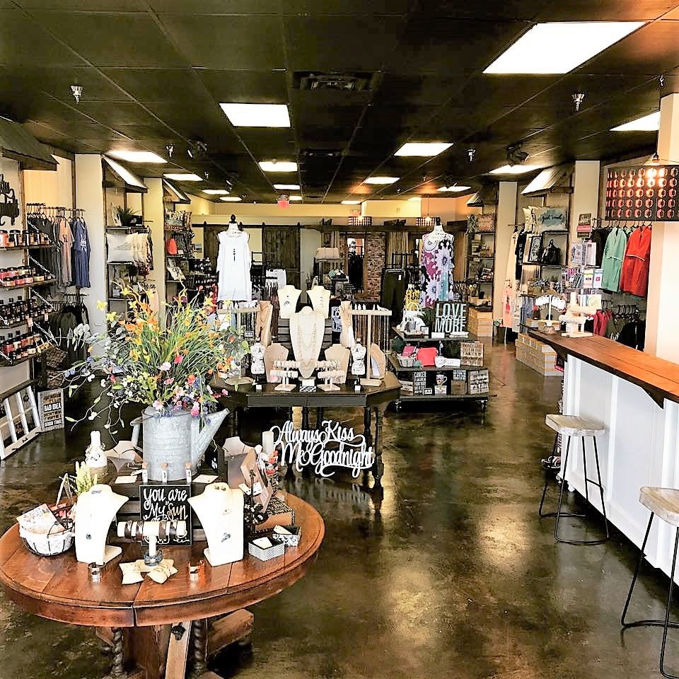 image of inside store, shoing home decor, jewelry, and clothing